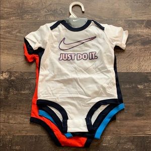 NWT 4 Nike Onesies